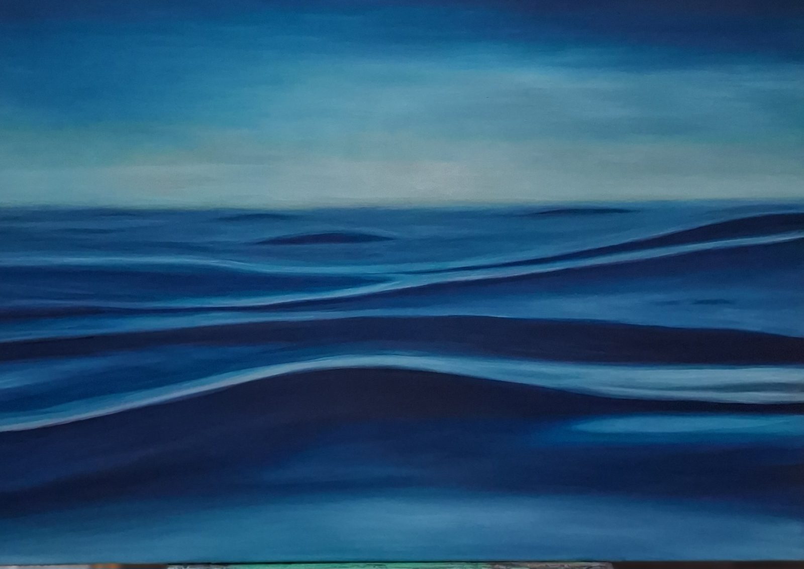 Calm blue sea in soft waves