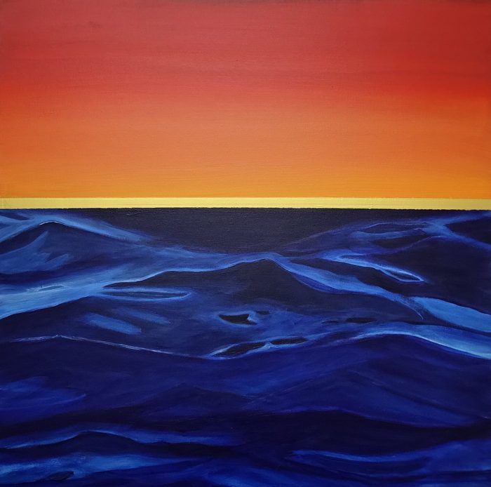 Atardecer rojo – deep blue waves under a red and orange sky